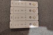 Four Nintendo Wii Original controllers