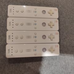 Four Nintendo Wii Original controllers