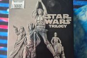 Star Wars Trilogy Box Set DVD First Remastered Featuring 4 Discs.