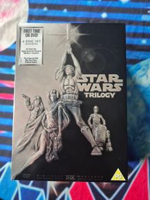 Star Wars Trilogy Box Set DVD First Remastered Featuring 4 Discs.