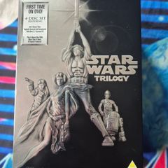 Star Wars Trilogy Box Set DVD First Remastered Featuring 4 Discs.