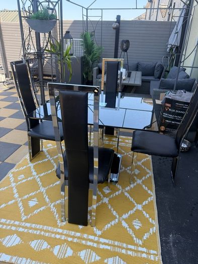 Black Glass and chrome dining table and chairs