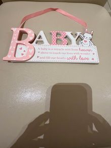 Baby hanging sign sentiment quote
