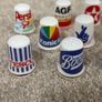 A Collection of Vintage Thimbles with Company Logos Image 2