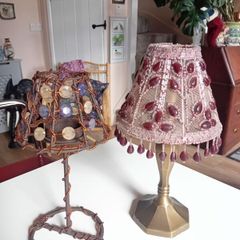 A pair of vintage tealight holders