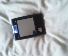 compact mirror with light , would fit in handbag .