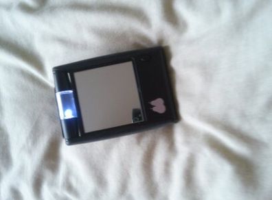 compact mirror with light , would fit in handbag .
