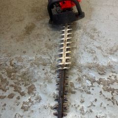 Battery Weed eater and petrol hedge trimmer