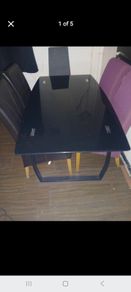 black glass dining table and chairs