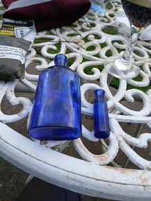 two colbolt blue bottles