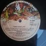 Genesis three sides live . Irish press on The famous Charisma label No sleeve . record 1 of a 2 record set Image 2