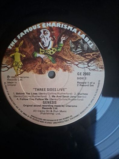 Genesis three sides live . Irish press on The famous Charisma label No sleeve . record 1 of a 2 record set