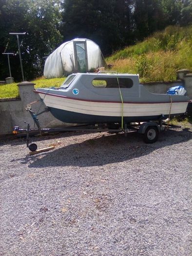 Boat and trailer  and cover