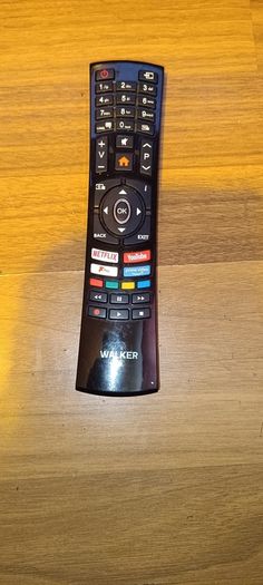 Walker 55 inch 4K TV with glass stand