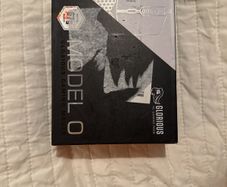Glorious Model O wired gaming mouse in sealed packaging