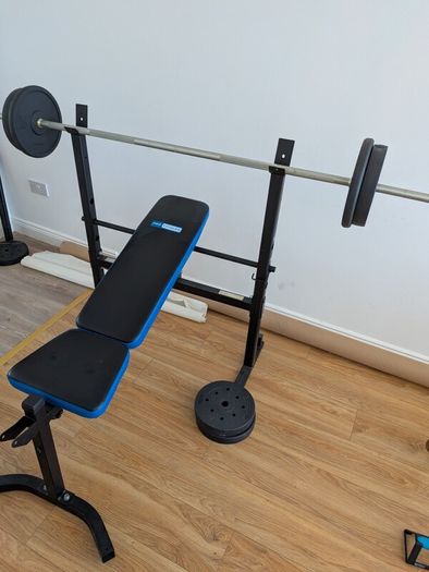 Adjustable Weight Bench with Barbell and Plates