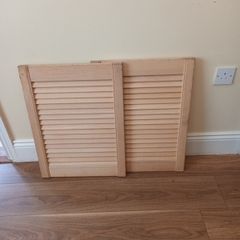 a pair of louvre doors for cabnet