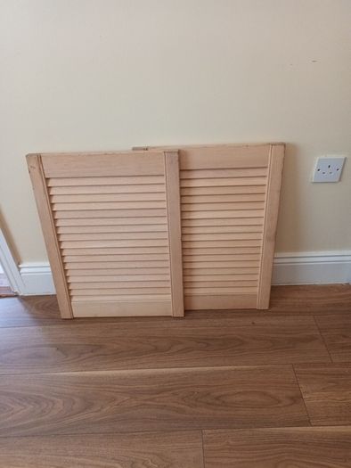 a pair of louvre doors for cabnet