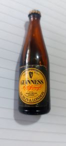 Vintage original Guinness miniature advertising bottle,with liquid inside some of of it must of evaporate,,hard to come by ,price includes free shipping within Ireland thank you, sold as seen, see pictures,,