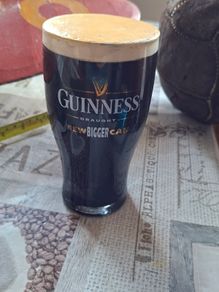 Bar Advertisement Classic Branded Guinness Pint Glass filled with a Displayed Pint of Guinness Draught, Postage Available or Collection