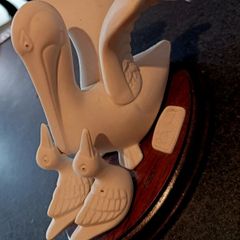 Pelicans bisque statue
