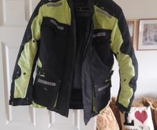 Selection of quality motorbike jackets,  trousers,  helmets  , and boots ..