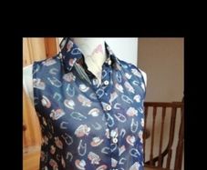 Ladies Lustre Top,  decorated with cowboy hats and horseshoes. new with tags.