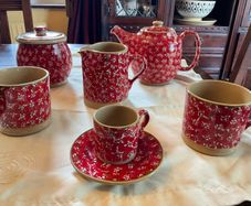 Nicholas Mosse Red lawn first quality unused items for sale . Individually priced . Pricing the large mug for this ad
