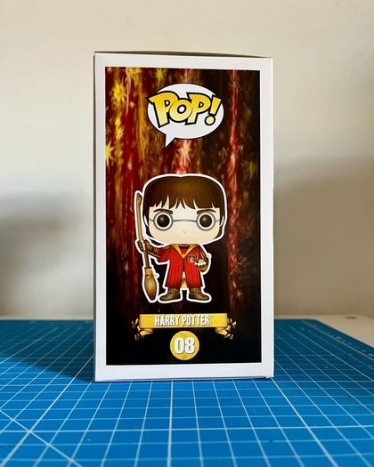 Harry Potter in Quidditch Robes #08 - Harry Potter - Movies - Funko Pop