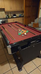 Pool table. (Flips to air hockey table)
