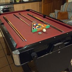 Pool table. (Flips to air hockey table)