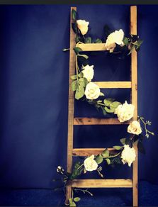 Vintage ladder with floral decor
