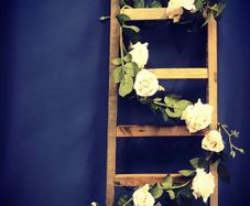Vintage ladder with floral decor