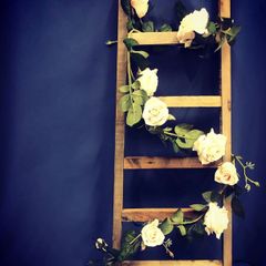 Vintage ladder with floral decor