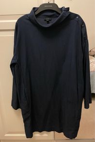cos roll neck dark dress with pockets and button shoulder detail