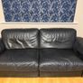 Black leather Natuzzi sofa and two chairs Image 2