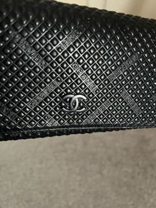 Chanel-style black leather purse