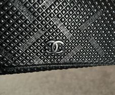 Chanel-style black leather purse