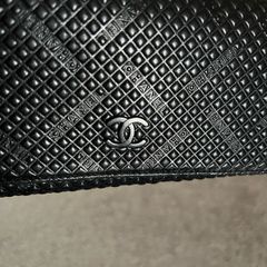 Chanel-style black leather purse