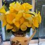 Faux Flowers in Pretty Jug. Image 2