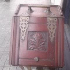 a antique wooden coal holder
