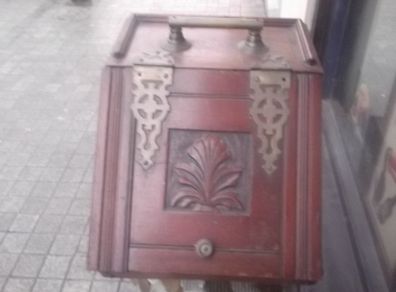 a antique wooden coal holder