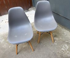 2 grey dining chairs eames style