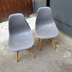 2 grey dining chairs eames style