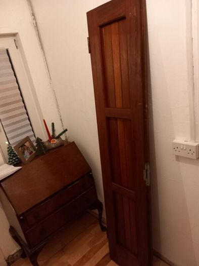 solid teak door with bolt
