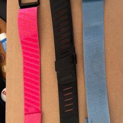 Whoop 4.0 Two limited editions and one breast aware size Large wrist bands. In good condition