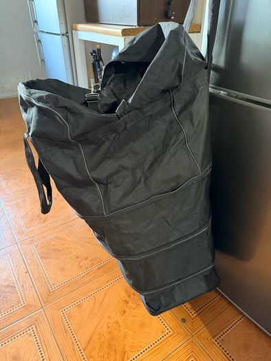 Two extra-large wheeled bags for organizing things; only one zipper doesn't work, but replacing it will make them like new.