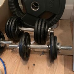 Two 30kg Adjustable Cast Iron Dumbbell Sets available in good used condition.