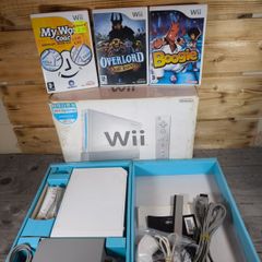 nintendo wii boxed with 3 games .