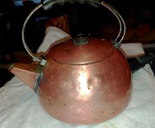 Large vintage copper kettle with bakelite handle